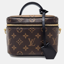 Louis Vuitton: Коричневая сумка 