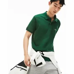 LACOSTE: Зелёное поло