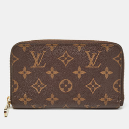 Louis Vuitton: Коричневый кошелёк  Zippy