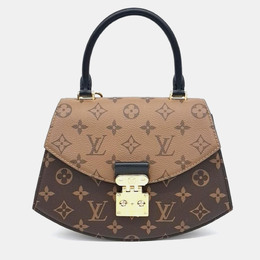 Louis Vuitton: Коричневая сумка 