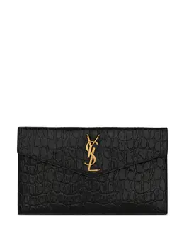 Saint Laurent: Чёрный клатч Monogram