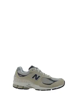 New Balance: Бежевые кроссовки 