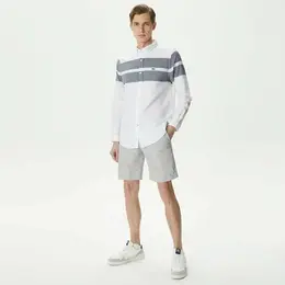 LACOSTE: Светлые шорты 