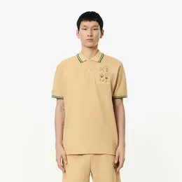 LACOSTE: Бежевое поло 