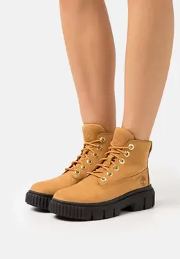 Timberland: Бежевые ботинки 