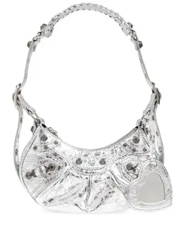 Balenciaga: Серебристая сумка  Le Cagole