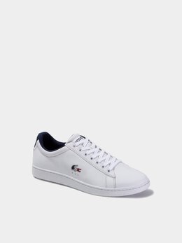 Lacoste: Белые кеды  Carnaby Evo