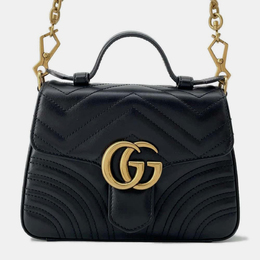 Gucci: Чёрная сумка  GG Marmont