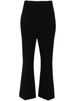 Victoria Beckham: Расклешённые брюки 