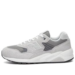 New Balance: Серые кроссовки 