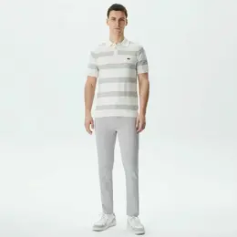 LACOSTE: Зауженные джинсы 