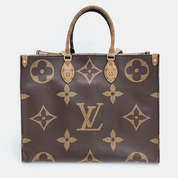 Louis Vuitton: Коричневая сумка 