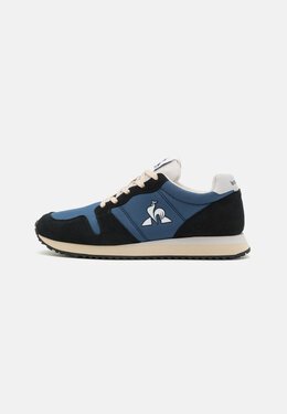 Le Coq Sportif: Чёрные кроссовки 