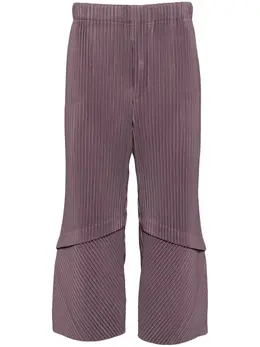 Homme Plissé Issey Miyake: Тёмные брюки 