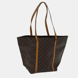 Louis Vuitton: Коричневая сумка-шоппер 