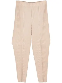 Homme Plissé Issey Miyake: Бежевые брюки 