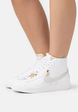 Nike: Белые кеды 