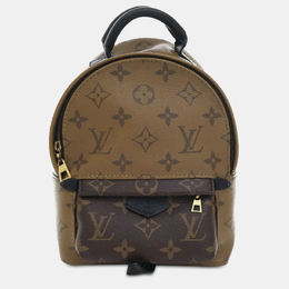 Louis Vuitton: Коричневая сумка 