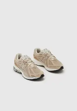 New Balance: Серые кроссовки 