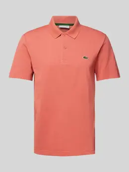 Lacoste: Розовая футболка 