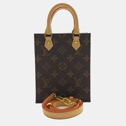 Louis Vuitton: Коричневая сумка 