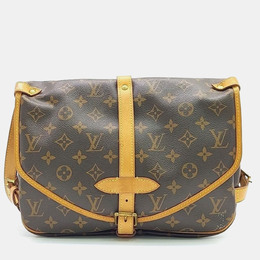 Louis Vuitton: Коричневая сумка 