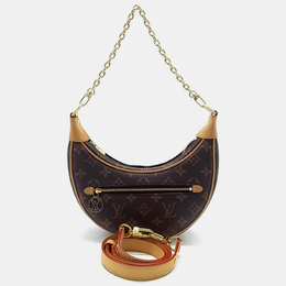 Louis Vuitton: Коричневая сумка 
