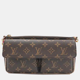 Louis Vuitton: Коричневая сумка 