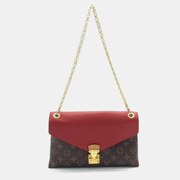 Louis Vuitton: Коричневая сумка 
