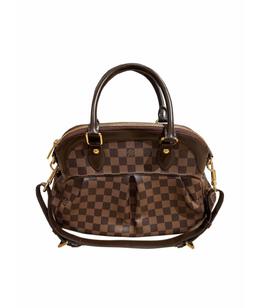 LOUIS VUITTON: Коричневая сумка 