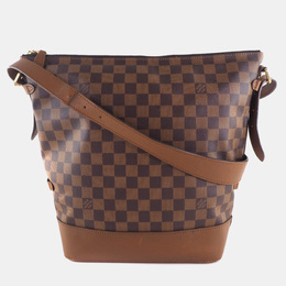 Louis Vuitton: Коричневая сумка 