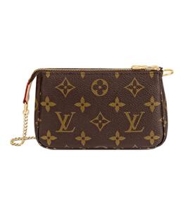 LOUIS VUITTON: Клатч 