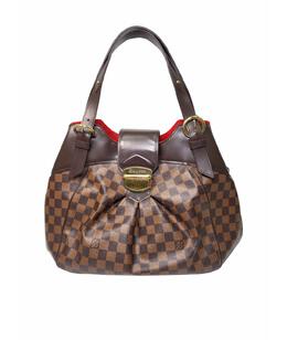 LOUIS VUITTON: Коричневая сумка 