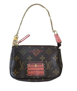 LOUIS VUITTON: Клатч 