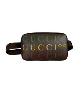 GUCCI: Коричневая поясная сумка 