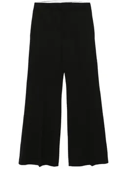 Victoria Beckham: Чёрные брюки 