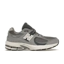 New Balance: Серые кроссовки 