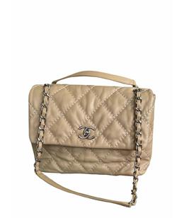 CHANEL: Бежевая сумка 