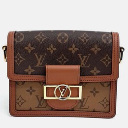 Louis Vuitton: Коричневая сумка 