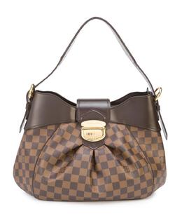 LOUIS VUITTON: Коричневая сумка 