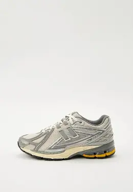 New Balance: Серые кроссовки 