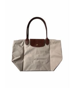 LONGCHAMP: Бежевая сумка 