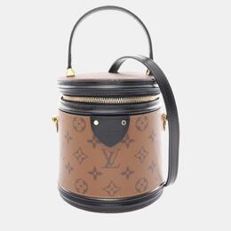 Louis Vuitton: Коричневая сумка 