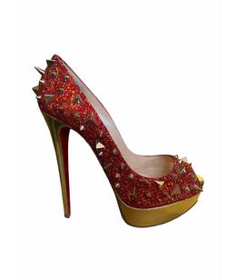 CHRISTIAN LOUBOUTIN: Яркие туфли 