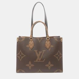 Louis Vuitton: Коричневая сумка-шоппер 