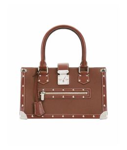 LOUIS VUITTON: Коричневая сумка 