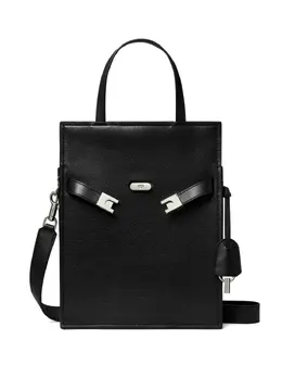 Tory Burch: Чёрная сумка  Lee Radziwill