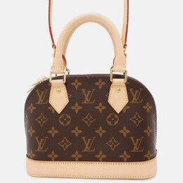 Louis Vuitton: Коричневая сумка 