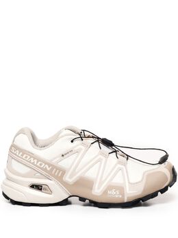 Salomon: Бежевые кроссовки 