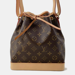 Louis Vuitton: Коричневая сумка 